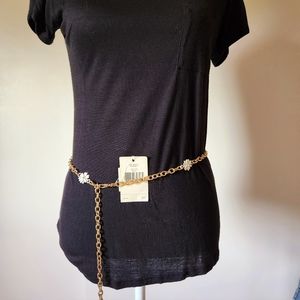 Kate Spade gold chain belt with daisy accents.